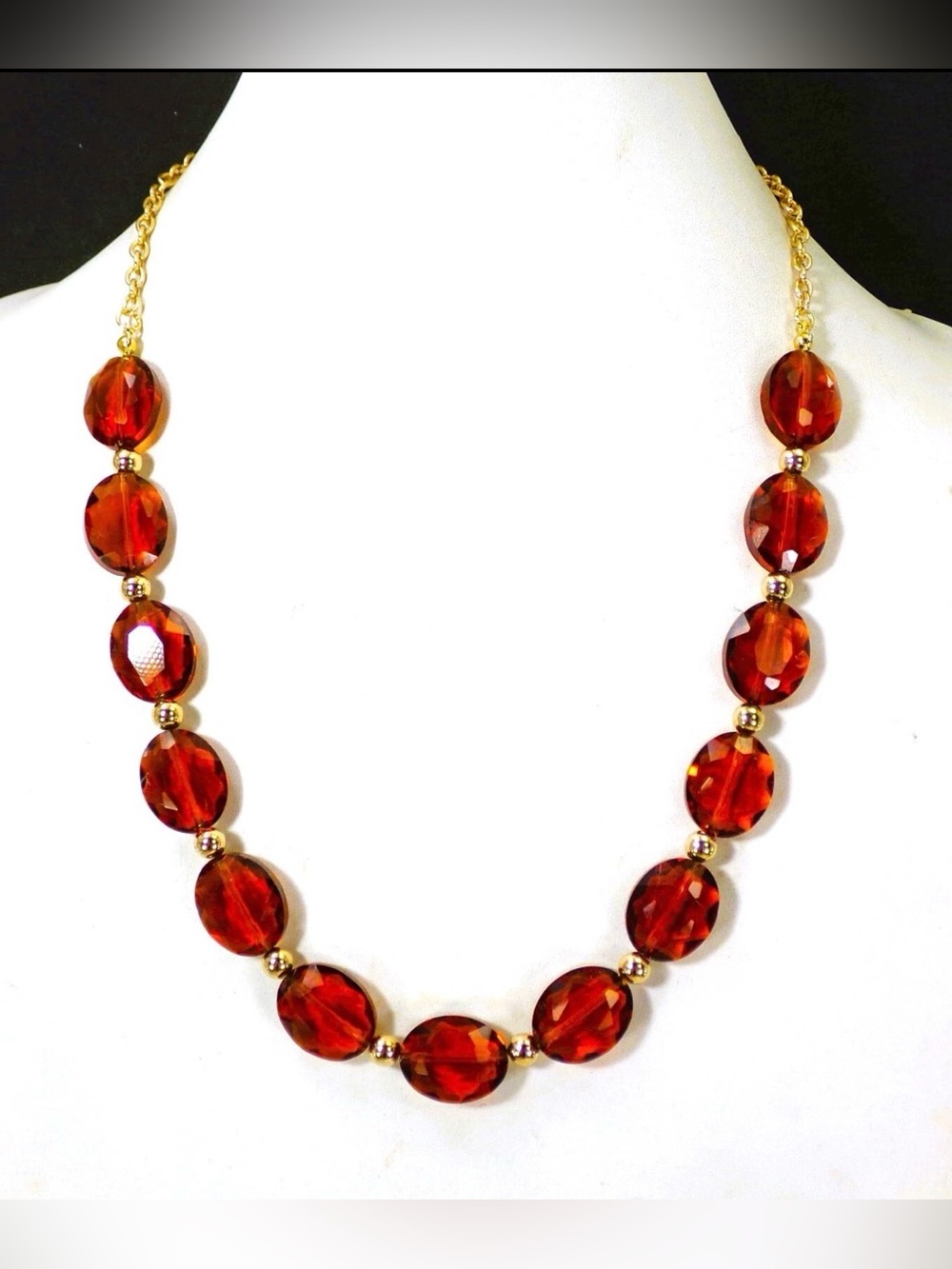 Brown glass bead necklace with oval glass beads and small round gold beads New
